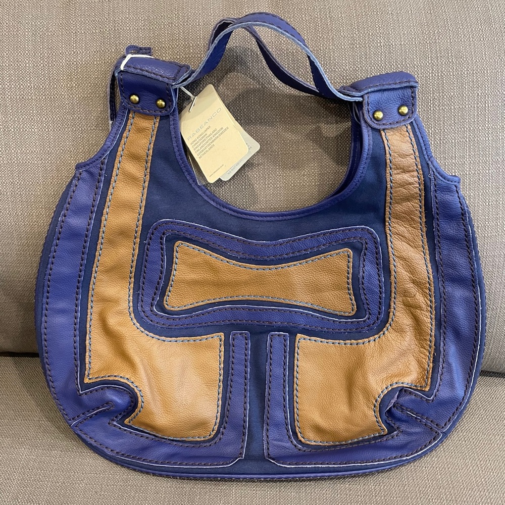 Purple and tan leather and canvas hobo